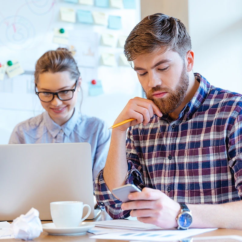 Young business people working in office